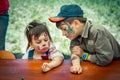 Cute and funny boy and girl with face paintings on Charity Family festival